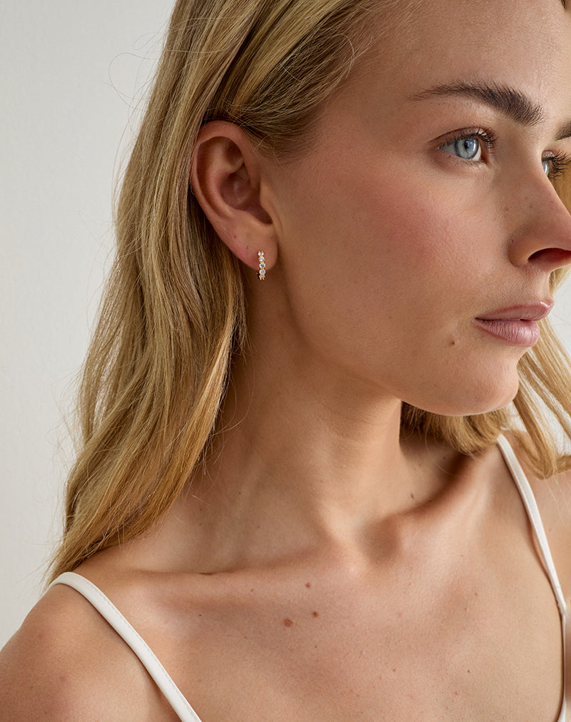 Image of Cubic Zirconia Gold Plated Hinged Huggies Hoop Earrings