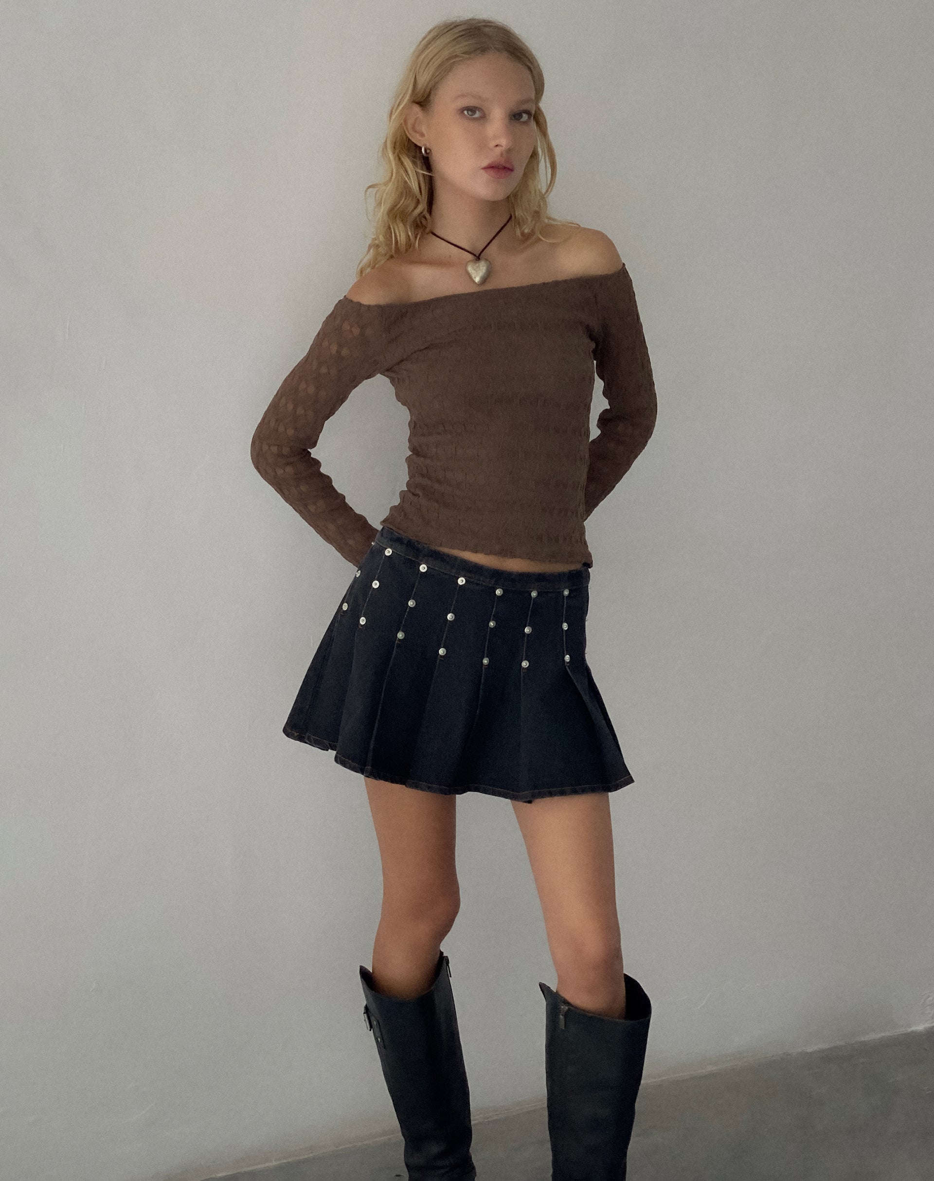 Image of Gatlin Pleated Denim Mini Skirt in Black Wash with Studs