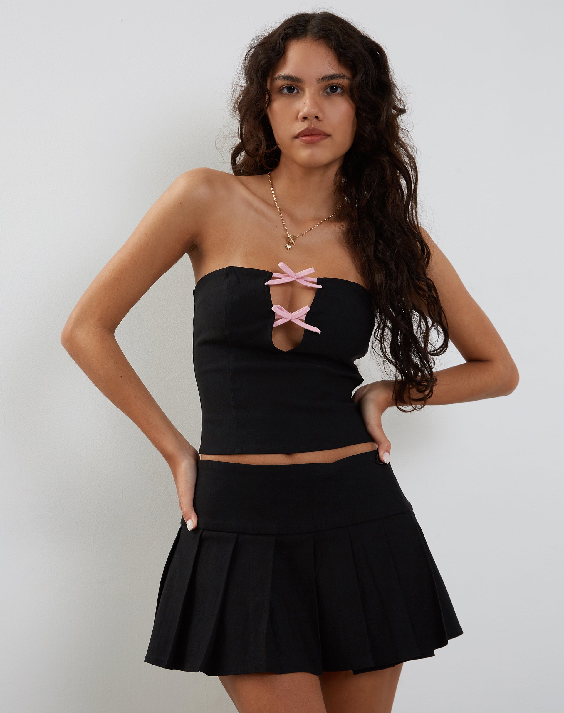 Image of Novanto Bandeau Top in Black with Pink Bows