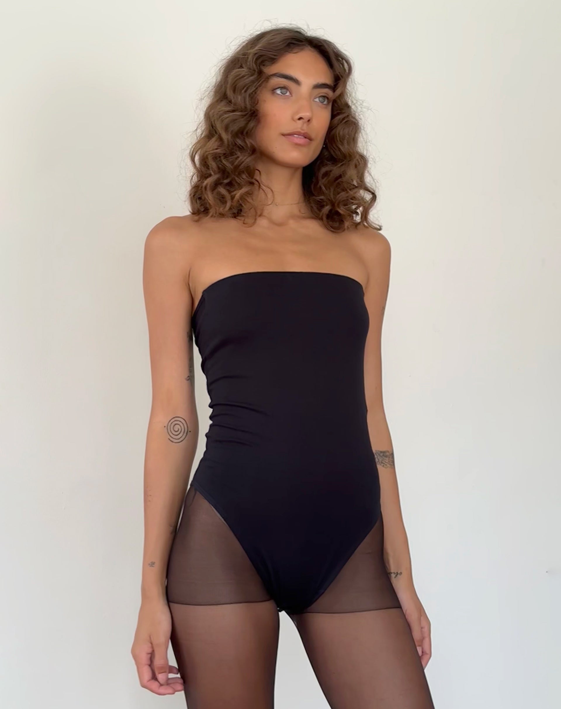 Black tube outlet top bodysuit