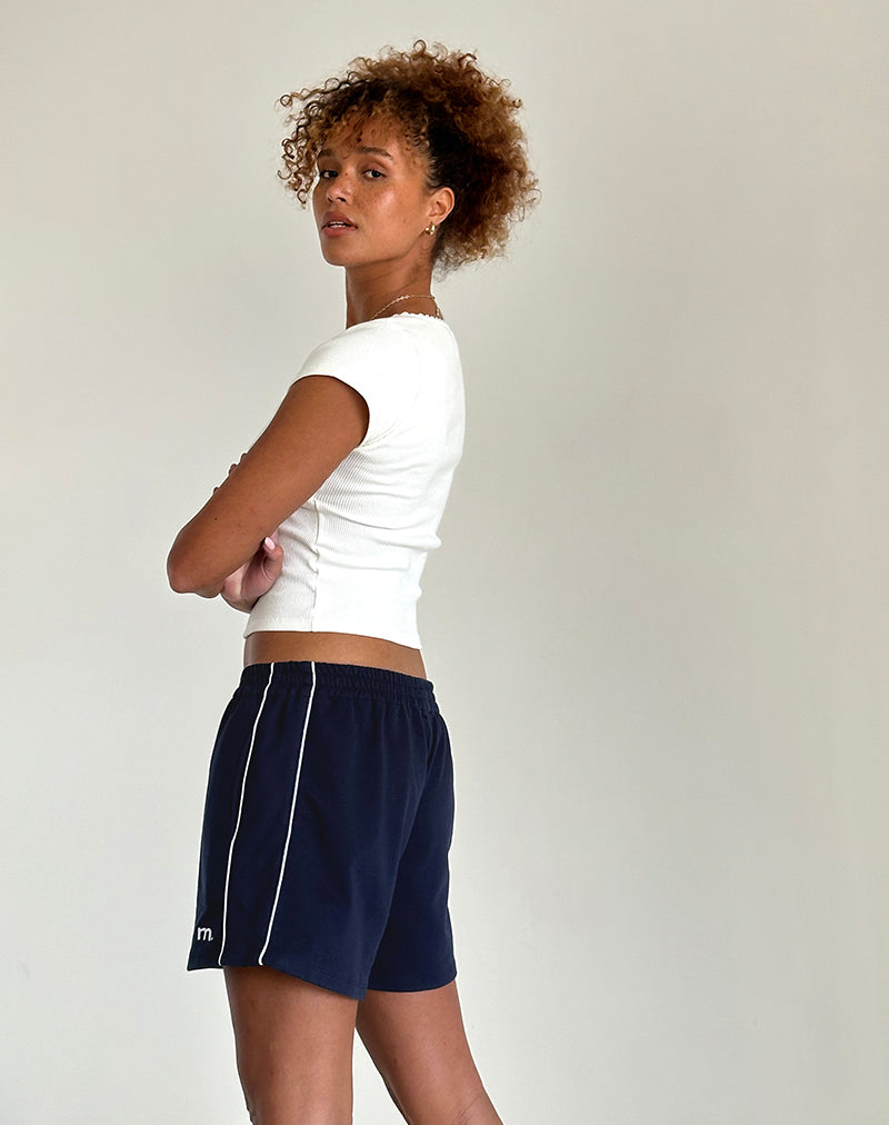 Image of Thera Short in Navy with White Piping with M Emb