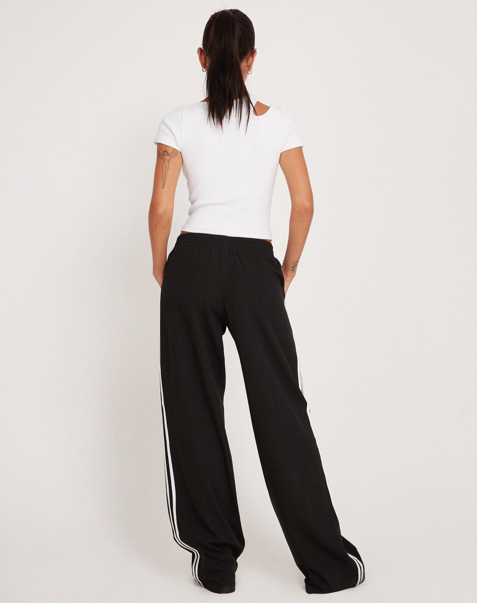 White trousers black sales stripe