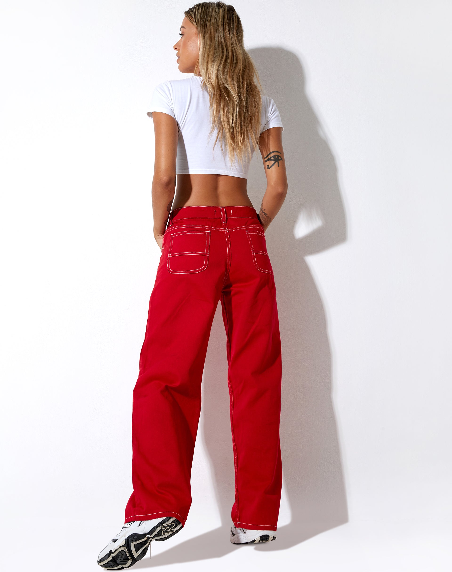 Red pants with white stitching 2025