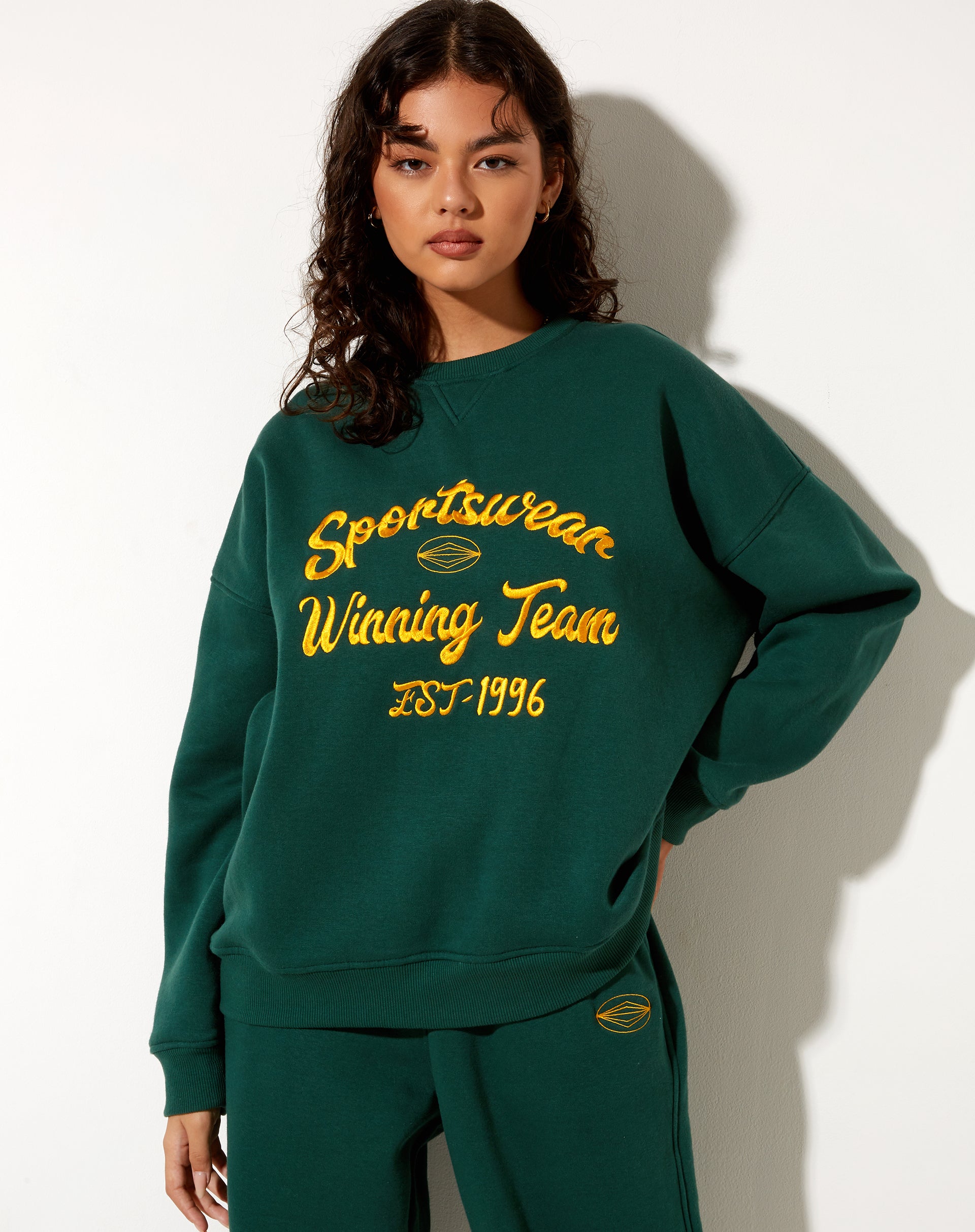 Image of Glan Sweatshirt in Forest Green in Winning Team Mix Embro