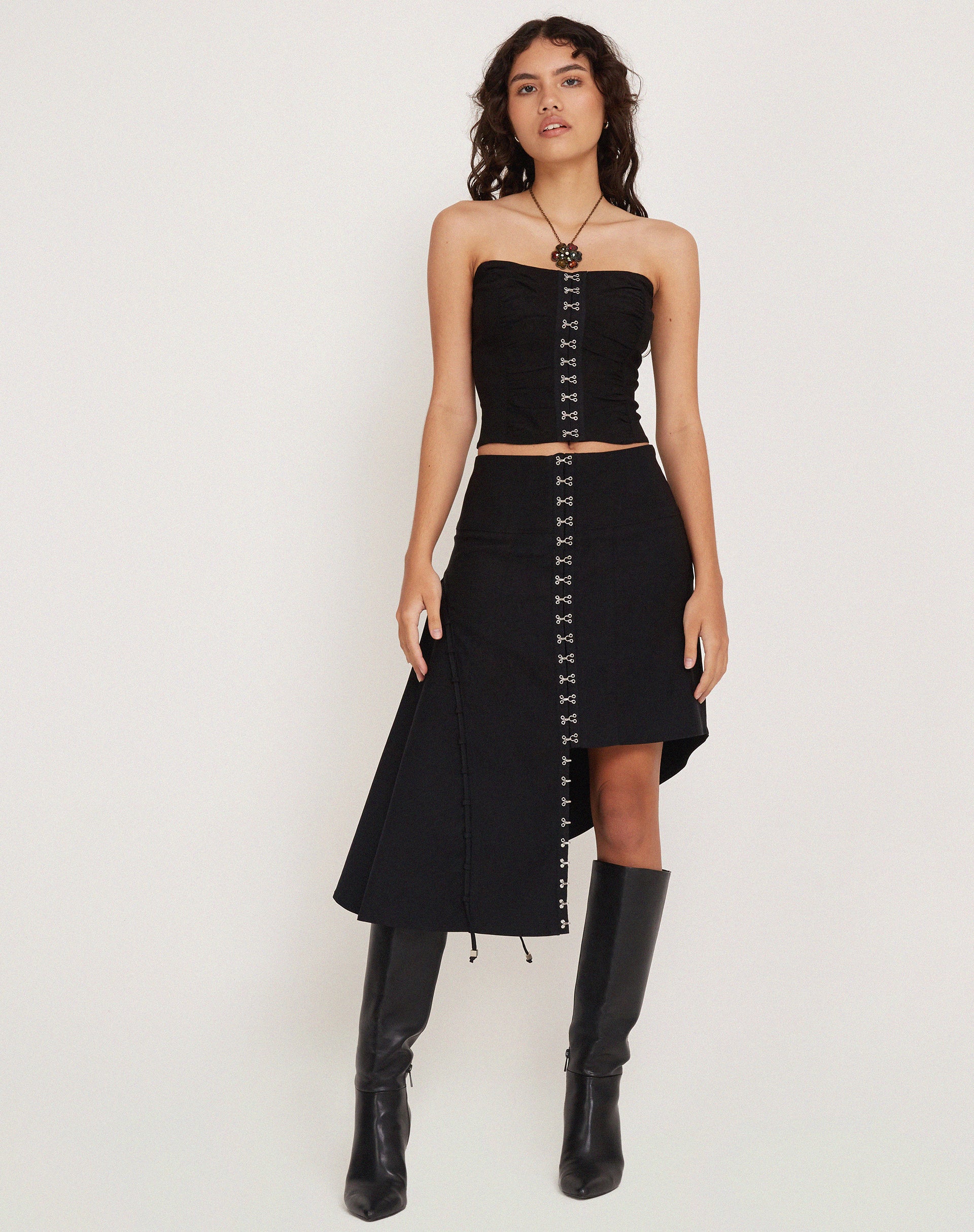 Image of Carlisia Asymmetrical Midi Skirt in Black