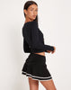 Image of Ranta Mini Skirt in Black with Ivory Binding