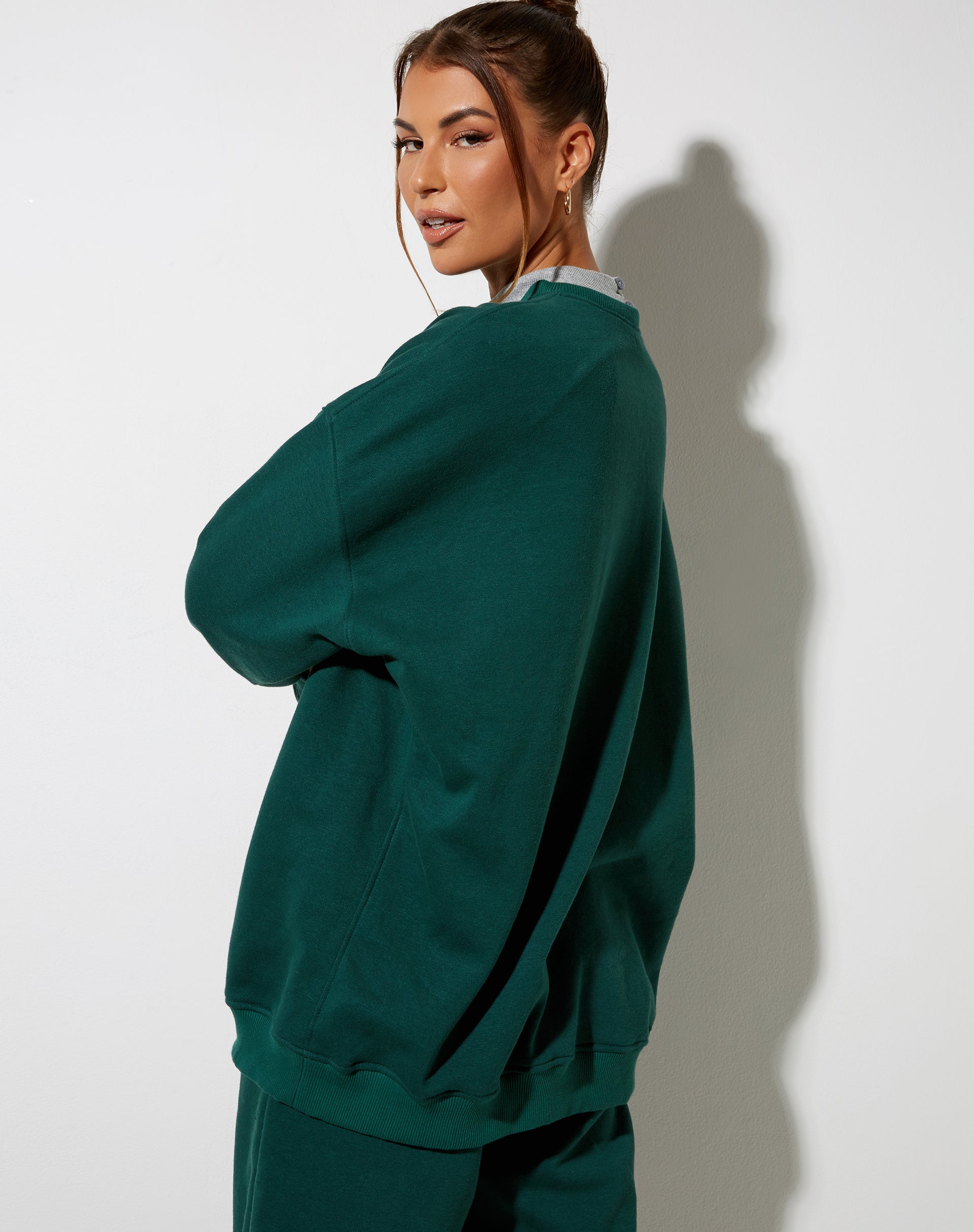Image of Glo Sweatshirt in Bottle Green with Angel Embro in White