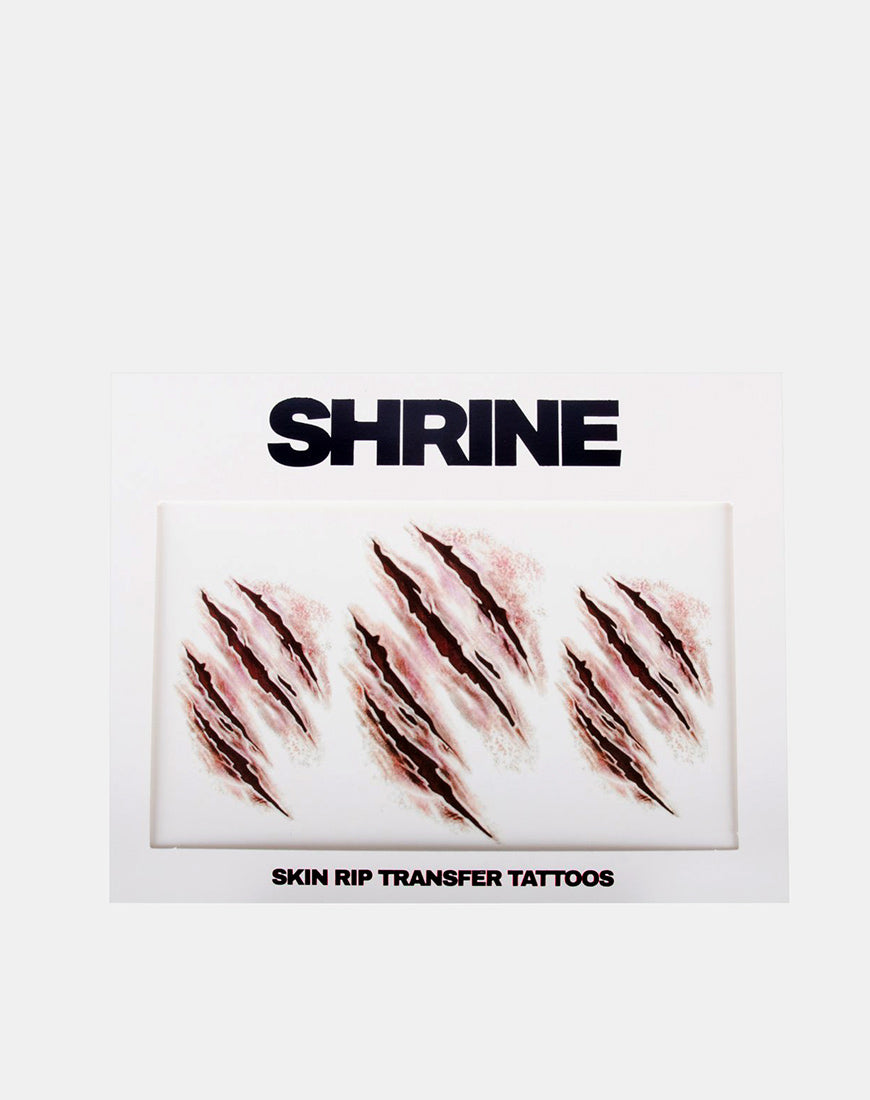 Skin Rip Transfer Tattoo by Shrine