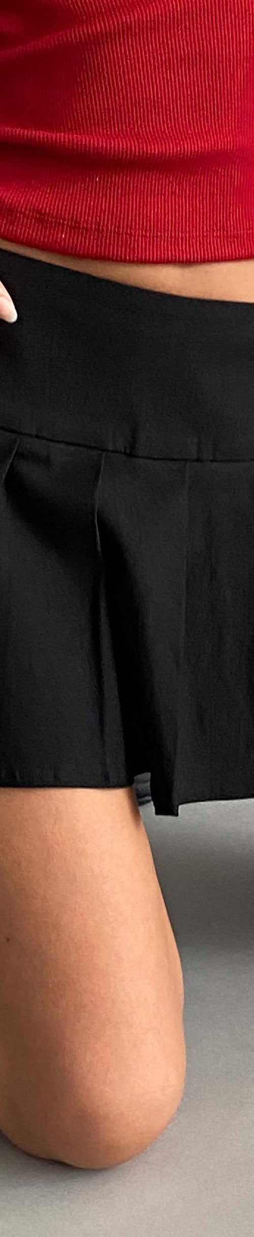 image of MOTEL X OLIVIA NEILL Casini Pleated Skirt in Tailoring Black